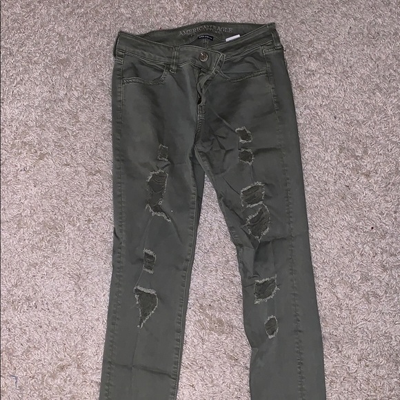 dark green ripped jeans